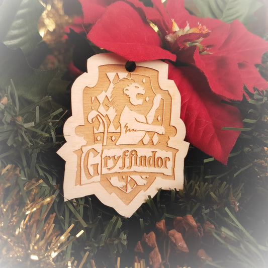 Laser engraved birch Christmas ornament with the Harry Potter Hogwarts House crest of Gryffindor.