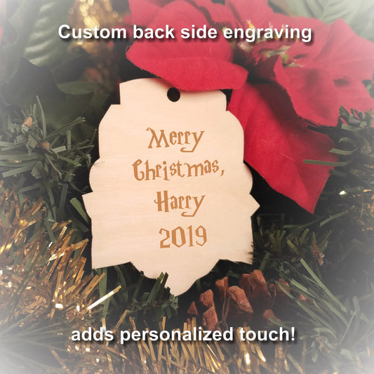 Laser engraved birch Christmas ornament with the Harry Potter Hogwarts House crest of Gryffindor. Add custom engraved text to the back for a personalized touch.