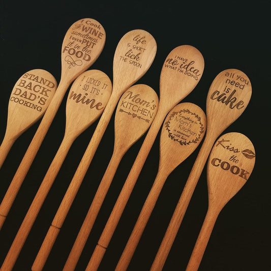 A selection of laser engraved beech wood spoons